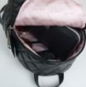 Beautiful GIGI HILL los Angeles backpack/bag purse.